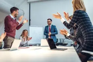 Showing their appreciation for an excellent business presentation